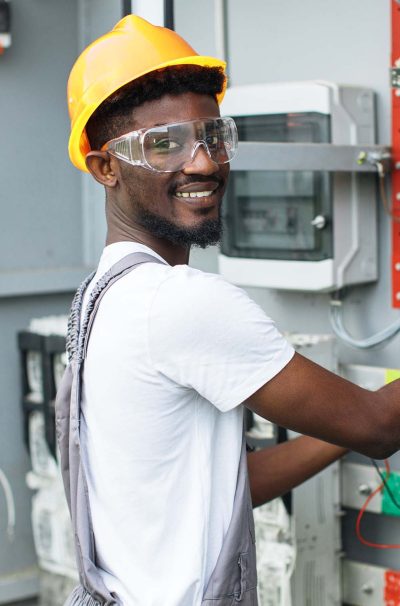 technician-examining-switchgear-on-solar-station-VP8JPVU.jpg